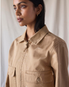 View of model wearing Seaworthy Khaki Dockers® x Transnomadica Mechanics Jacket.