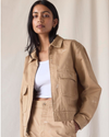 View of model wearing Seaworthy Khaki Dockers® x Transnomadica Mechanics Jacket.