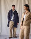 View of model wearing Seaworthy Khaki Dockers® x Transnomadica Mechanics Jacket.