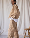 Side view of model wearing Seaworthy Khaki Dockers® x Transnomadica Officer Chino.