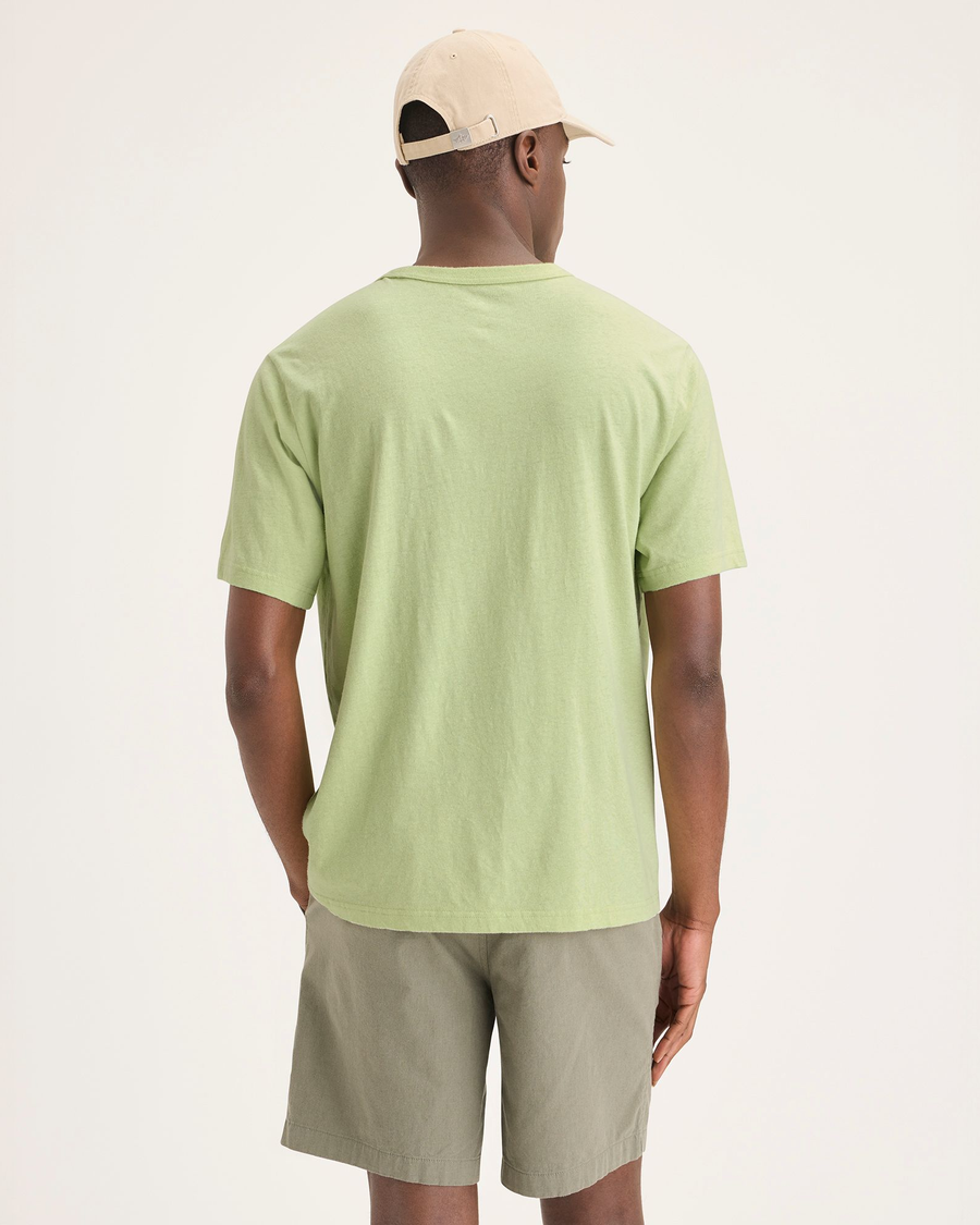 Back view of model wearing Seedling Men's Regular Fit Original Tee Shirt.