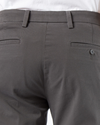 View of model wearing Storm Workday Khaki Pants, Slim Fit.