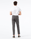 Back view of model wearing Storm Workday Khaki Pants, Slim Fit.