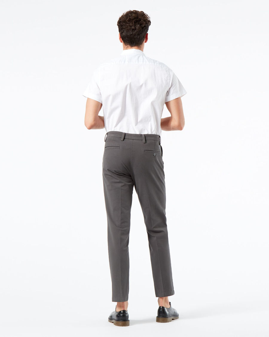 Back view of model wearing Storm Workday Khaki Pants, Slim Fit.