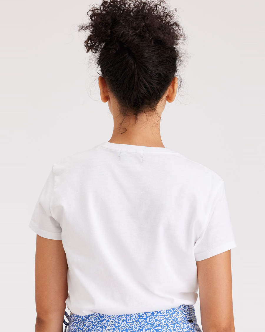 Back view of model wearing Sumi Flowers Lucent White Women's Slim Fit Graphic Tee Shirt.