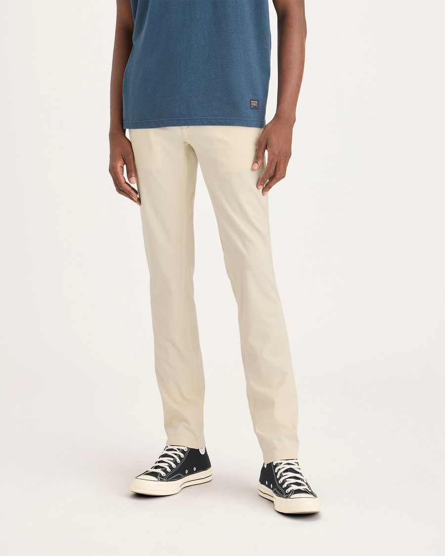 Front view of model wearing Summer Earth Men's Skinny Fit Smart 360 Flex California Chino Pants.