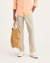 Front view of model wearing Summer Earth Men's Slim Fit Smart 360 Flex California Chino Pants.