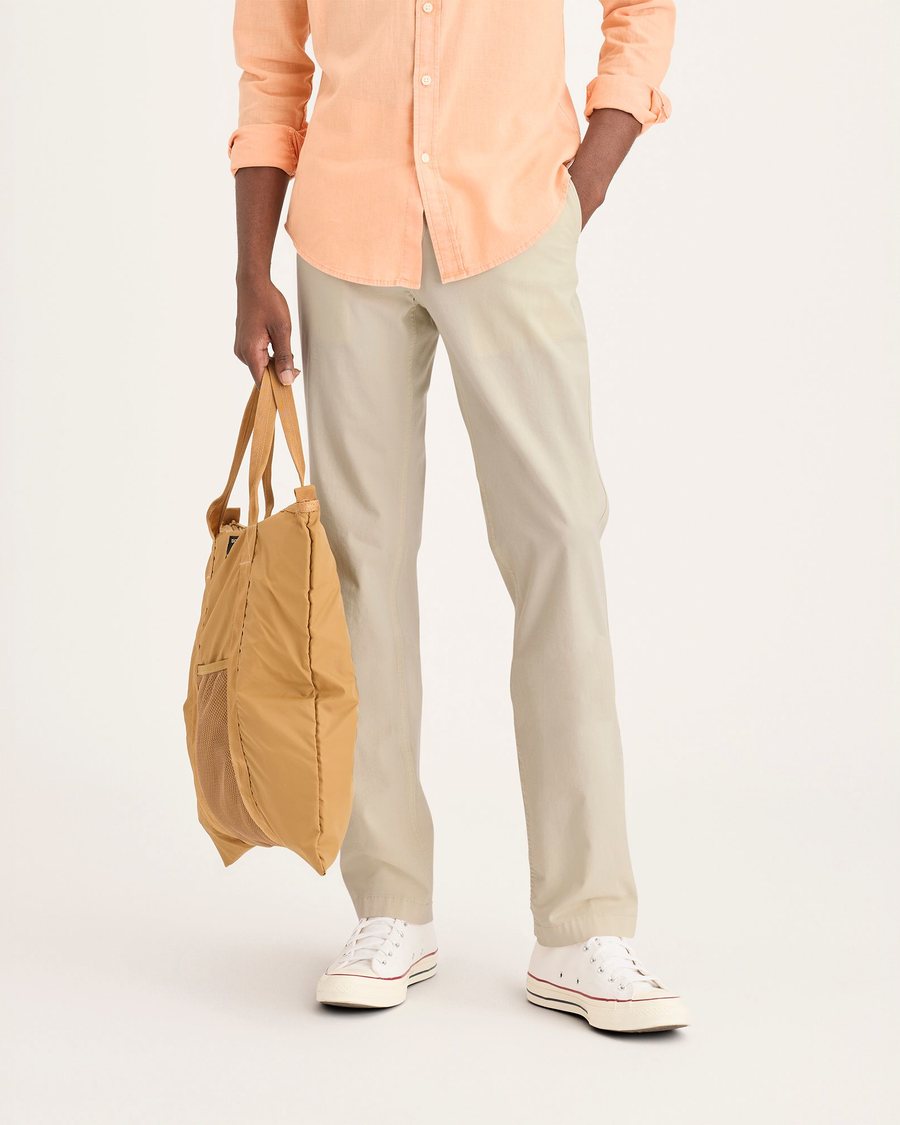 Front view of model wearing Summer Earth Men's Slim Fit Smart 360 Flex California Chino Pants.