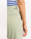 View of model wearing Tea Blake Chino Pants, High Straight Fit.