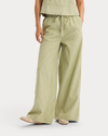 Front view of model wearing Tea Drawstring Pants.