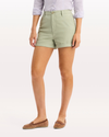 Side view of model wearing Tea Original Chino Shorts.