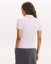 Back view of model wearing Thistle Polo, Slim Fit.