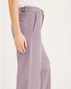 Side view of model wearing Toadstool Blake Chino Pants, High Straight.