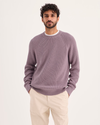 Front view of model wearing Toadstool Crewneck Sweater, Regular Fit.