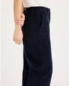 Side view of model wearing Total Eclipse Blake Chino, High Straight Fit.