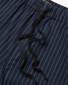 View of model wearing Total Eclipse Drawsting Pant, Regular Fit.