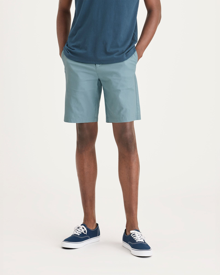 Front view of model wearing Tourmaline Men's Supreme Flex Modern Chino Short.