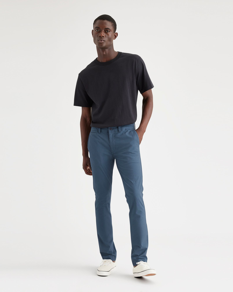 View of model wearing Vintage Indigo Men's Skinny Fit Smart 360 Flex California Chino Pants.