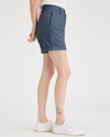 Side view of model wearing Vintage Indigo Women's Original Chino Shorts.
