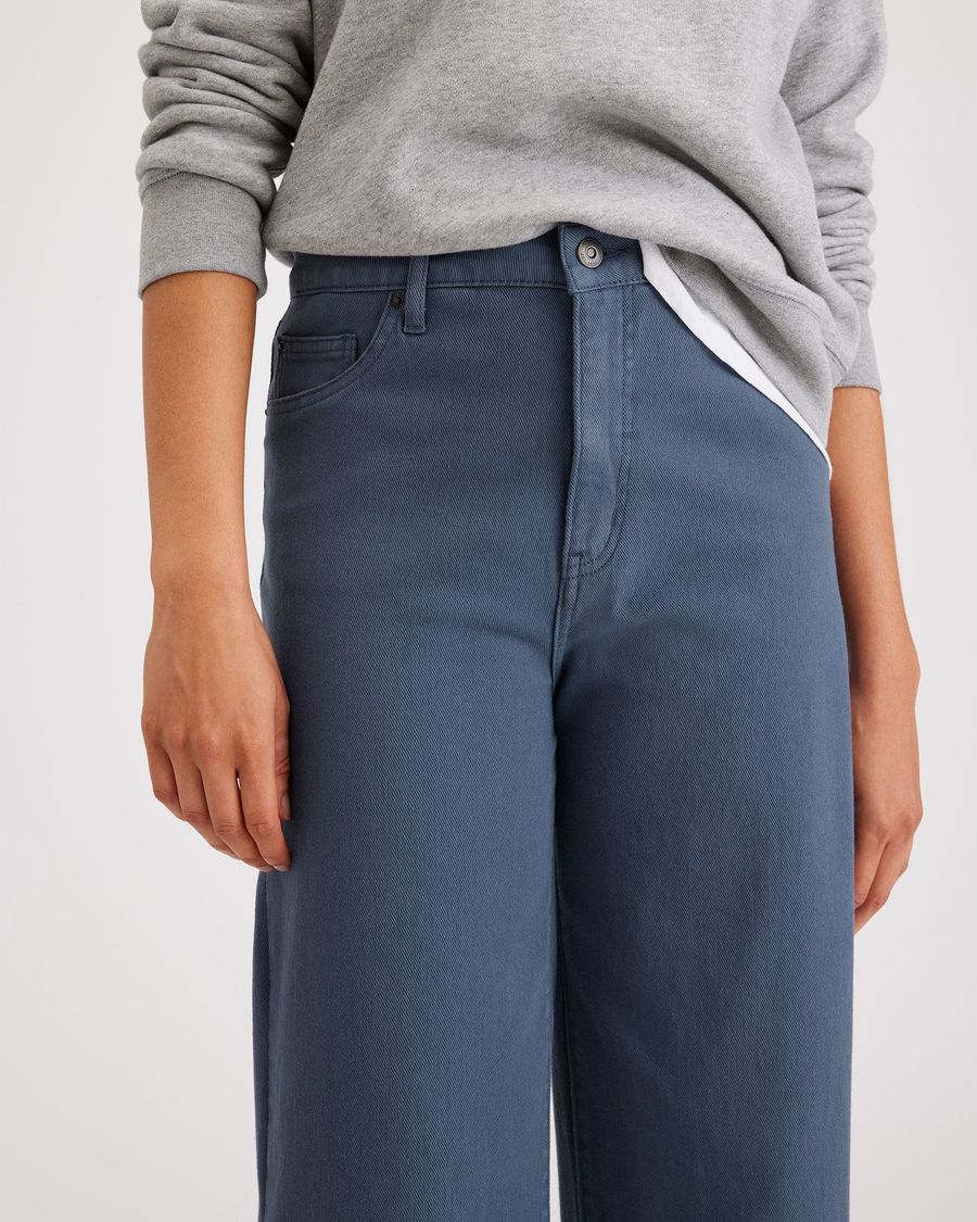 View of model wearing Vintage Indigo Women's Straight Fit High Jean Cut Pants.