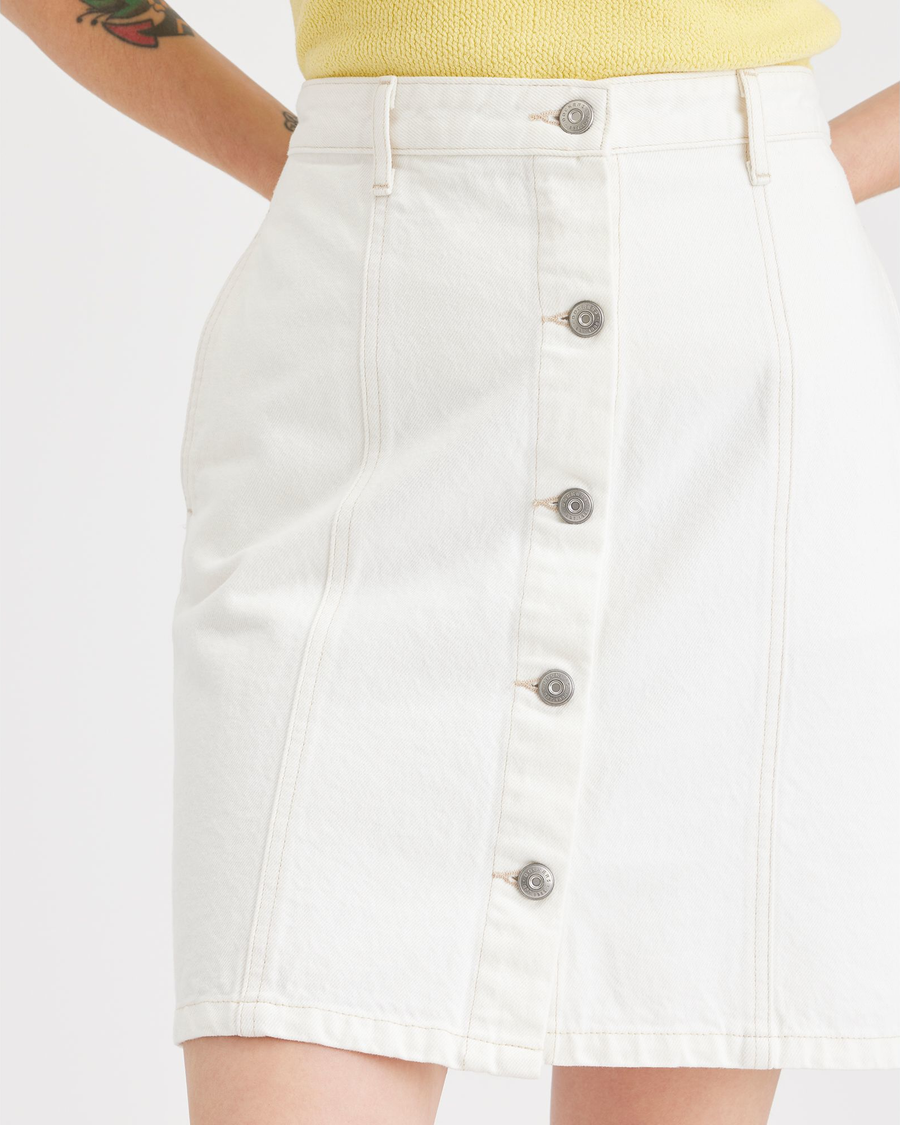 View of model wearing White Garment Dye Women's Button Front Mini Skirt.
