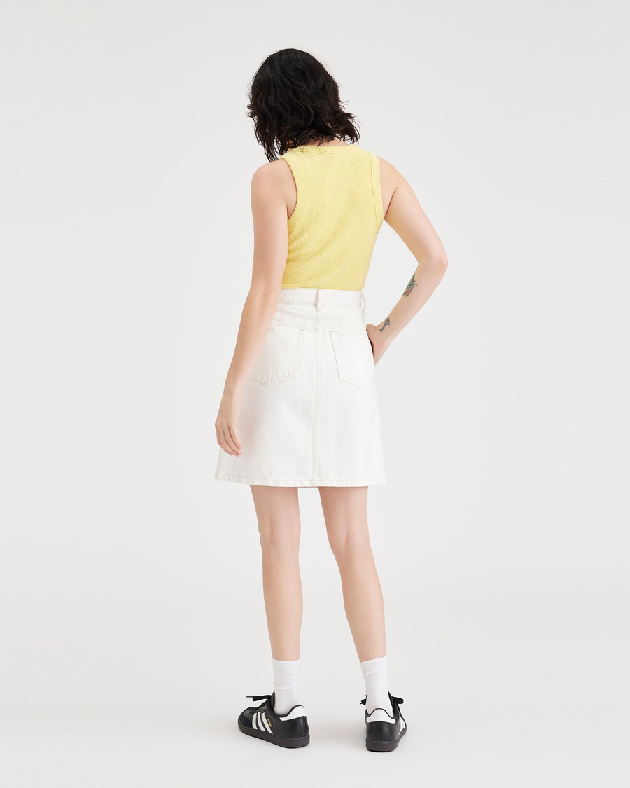 Back view of model wearing White Garment Dye Women's Button Front Mini Skirt.