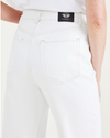 View of model wearing White Garment Dye Women's Straight Fit High Jean Cut Pants.